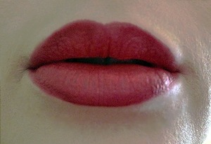 Slight ombré lips using Kate moss Matt lipstick and rimmel shades, pat over with fixing powder then re apply