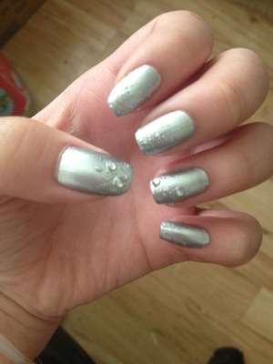 Silver with glittered ombré effect. 