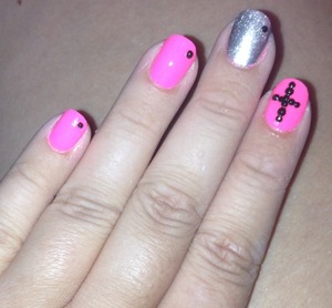 Pink and silver cross nails with black rhinestones