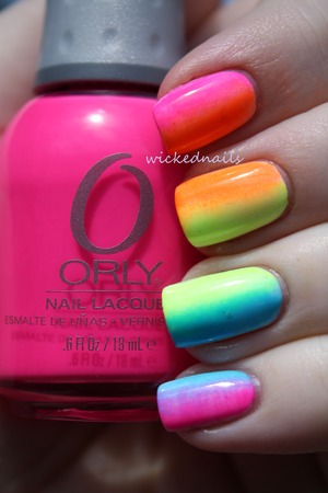 Rainbow Neon Gradient sponged on over white using wedge makeup sponge. Made popular on Instagram and Tumblr, this design was originally inspired by The Swatchaholic