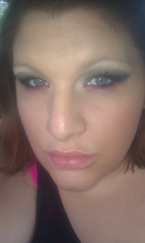 This is a smokey eye with a pop of hot pink (it looks more purple on cam).