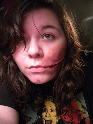 Half of a glasgow smile. I ran out of scar wax before I was finished, but I like how it turned out anyways. 