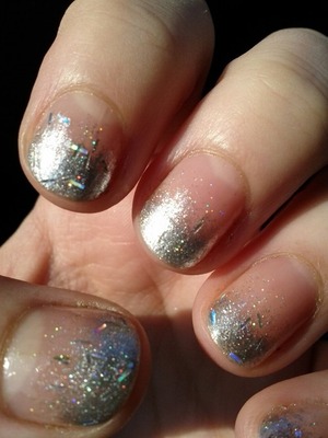 Done with silver polish, bar glitter, and holographic rainbow glitter.