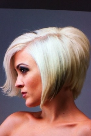 An edgy look I rocked during my time spent in DC. Asymmetrical A-line bob, with black peekaboos.