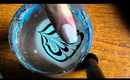 blue and black water marble nail art tutorial