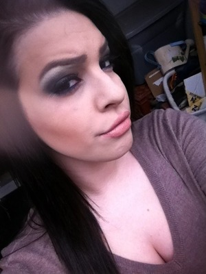 Super smokey brown and black eyeshadow with pure white highlight and nude lipstick. 