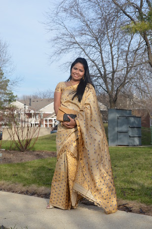 This is a traditional dress from Assam, a north-eastern state in India. Its a two-piece dress much like an Indian Saree!