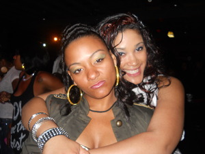 Me and my Bestie at a Rick Ross concert.  Eyes done in olive green and gold to match my outfit