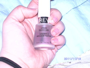 this is Revlon liquid quick dry I use this alot with all my stuff after i finish polishing my nails. never have to worry about messing up my nails when i think they are dry!