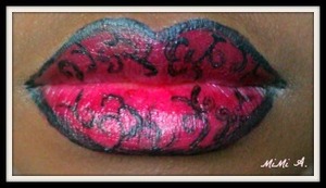 Here is a photo of the whole design. There is another one but at different angles here http://www.beautylish.com/f/jrvxsc/lip-art-red-and-black-swirls