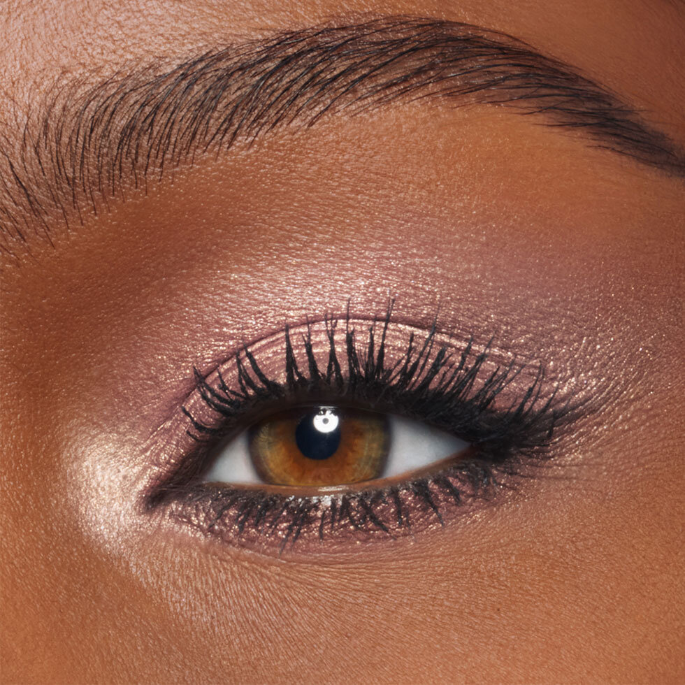 Charlotte Tilbury model wearing the Exagger-Eyes Waterproof Eyeshadow Stick in Ballet Quartz