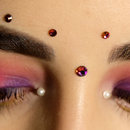 Purple and pink fairy eyes with pearls and gems