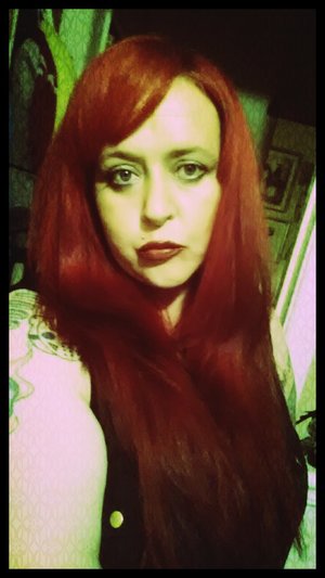 Touched up hair using different shade of RED. Far less bright than usual but digging it nonetheless. 