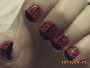 My little sister's friend wanted me to do her nails like lady bugs and this is what I came up with.