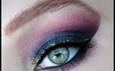 Teal/purple makeup with gold glitter eyeliner by @makeupbyeline