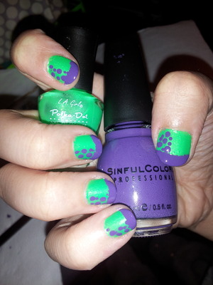 This is my first time doing my own nails thought I'd post this since i was inspired by all of your amazing nails. so how'd i do for my first time? :) <3

~I used a medium and small dot tool and Green L.A. Girl Polka Dot polish and Purple SinfulColors Professional polish