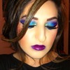 Blue and purple eye makeup with plum lips 