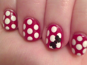 Here I used NYC  Big Apple Red, NYC French White and their black.  I used the end of a paintbrush for the large dots and a small dotting tool for the bows.