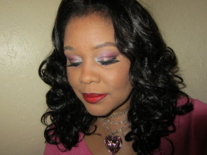 I wanted warm pinks and reds with a touch of glitter.  White Satin brightens the inner corners, Scarlet, a rich wine on the lids and bright Raspberry Jam in the crease.  Glitter applied to lids.  Visit colorelation.com.  MAC Ruby Woo on lips.