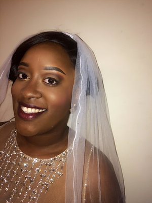 I turned this beautiful bride's day look to an evening look all by transforming her nude lip to this classic burgundy lip. Now she's ready to dance the night away! 