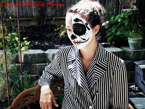 my friend Becca modeling for me with half sugar skull painted face