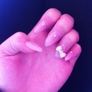Gel nails - nude stiletto bow nails