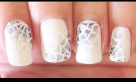 Sparkling Spiderwebs Halloween nail art