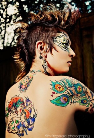 This photoshoot was a warrior of the jungle theme that focused on the extreme makeup style and tattoos. This is me :) I had alot of fun with it. 