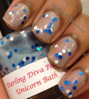 Sheer blue shimmery base with white and blue hex glitter.