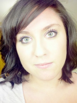 The purple eyeshadow enhances my green eyes.