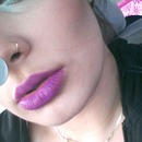 turquoise eyes , purple lips 