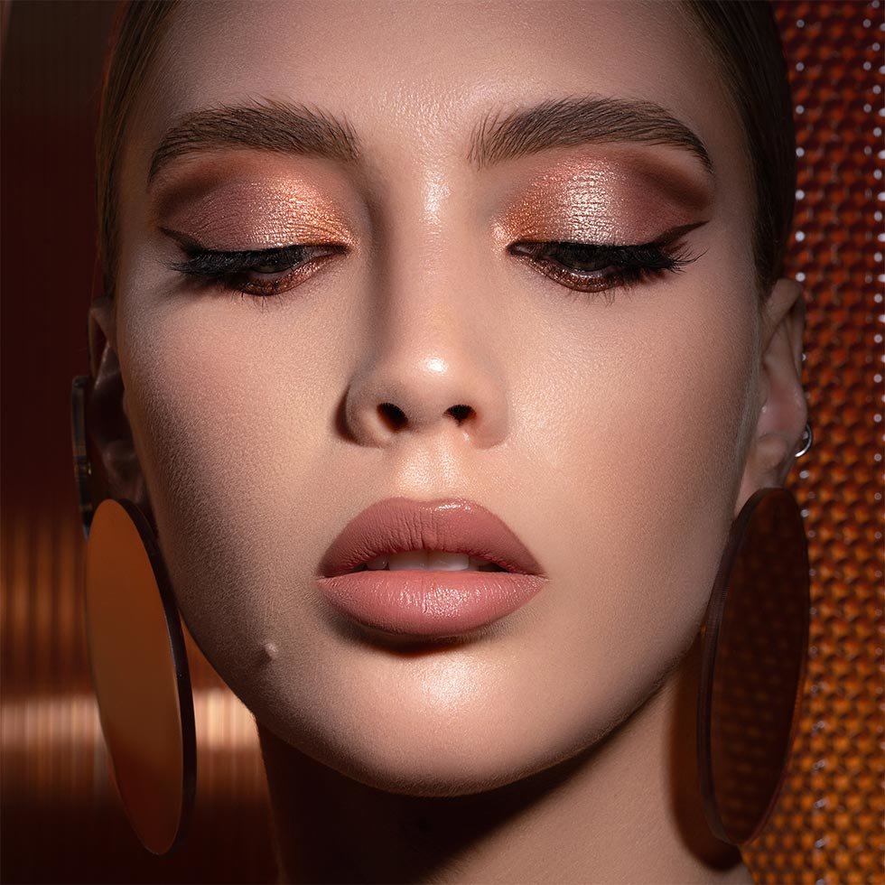 Natasha Denona model wearing the I Need a Warm Eyeshadow Palette