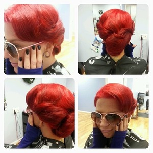 Vintage inspired updo I did at work on a friend. The hair color was also done by me.