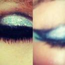 Black eye liner and glitter baby blue eye shadow!