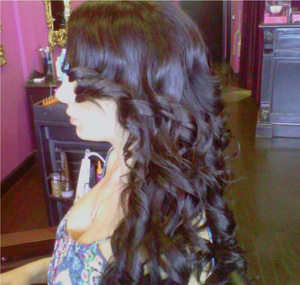 cascading curls with a side part
