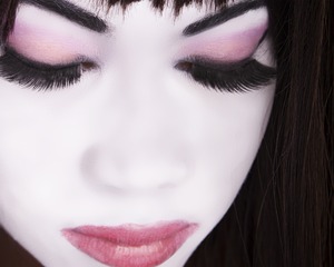 Completely airbrushed using Dinair Airbrush system and makeup.
Jet black on Eyebrows & liner, Fantasy white on skin, lilac in eye crease and eye edge,  dark pink peach on lid and lips.  Shine on top of lip color.  Flare lashes.