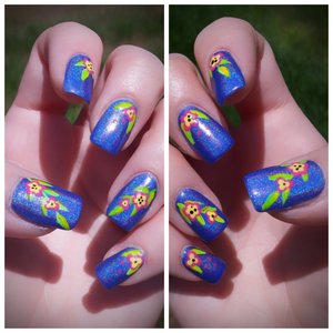 Tropical Floral Holographic Nails

First time attempting artificial acrylic nails on my own. They were done with 2 kits combined of brush-on gel and acrylic dipping by Kiss. The base color was KBshimmer holographic polish, and the simple designs were a combo of regular art acrylic paints and polishes applied with brushes and dotting tools. Loved the way these came out...perfect for the beautiful summer-like weather :)