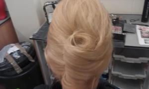 I did a 60s look on my friend and this is the hairstyle I incorporated in it