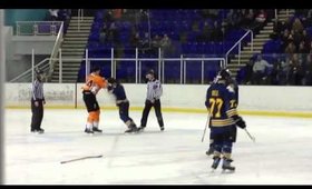 Mark Thomas hockey 'fight' at charity game