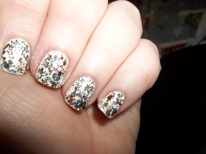 Kinda messy but opi rainbow connection over white!