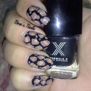 Before I added to the design I created a black base with two toned brown/beige leopard print spots.