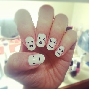 Guess my mood?  

The faces were drawn simply with a bobby pin! Who needs fancy nail tools? :)