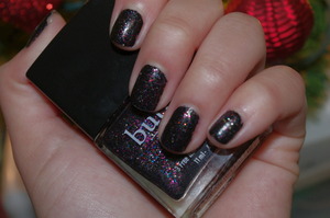 This is The Black Knight by Butter London that came in the Holiday 2012 collection painted over one coat of OPI Black Onyx.