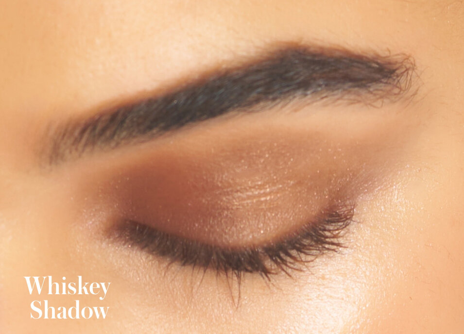 Model wearing the shade Whiskey Shadow from the rms beauty Rebel Glow ReDimension Hydra Eyes Quartet