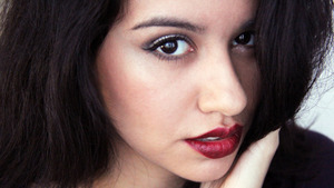 Going for an unconventional NYE look? Go vampy with a dramatic eye.