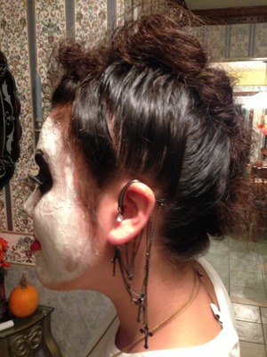 I did this Day of the Dead Mohawk hairstyle to my sister for Halloween.