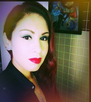 Green eye shadow and red lips are my current favorite combo.  Great for redheads. 