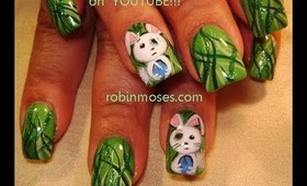 crazy looking emo bunnies on green green grass design: robin moses nail art tutorial