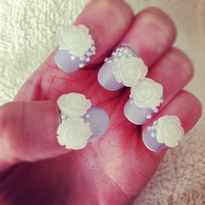 3D rose and pearl embellished lilac nails