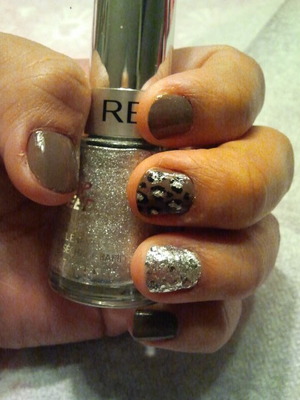 dark nude with glitter accent and leopard nail 